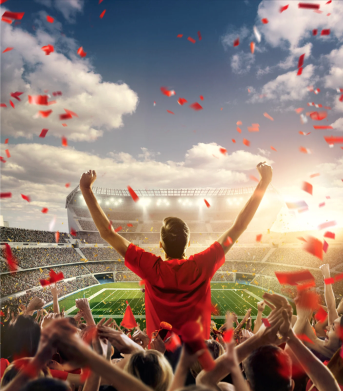 HirePlanner Team Sport checking phone in gym near weight machines